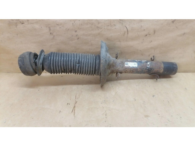 Передний амортизатор