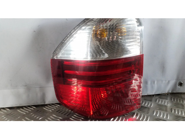Задний фонарь левый 7162209 BMW X3 E83 2003-2010 года