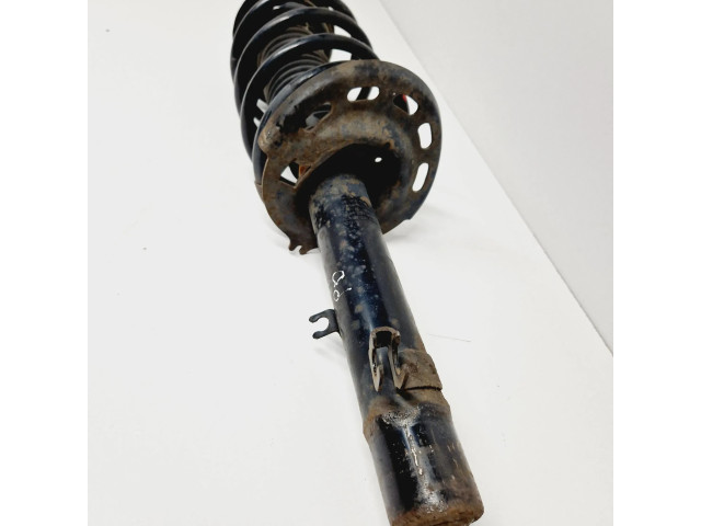 Передний амортизатор с пружиной      