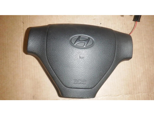 Подушка безопасности водителя 569001C000DB Hyundai Getz