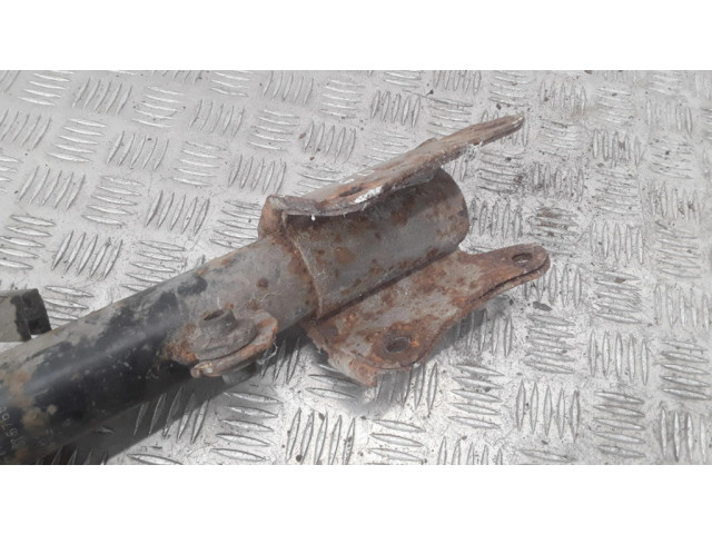 Задний aмортизатор