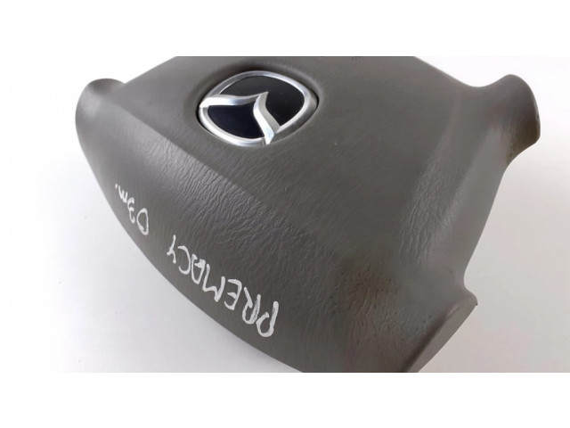 Подушка безопасности водителя LC6357K0005, T93141A Mazda Premacy