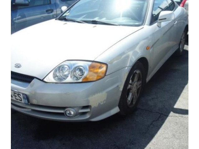 Блок подушек безопасности    Hyundai Coupe