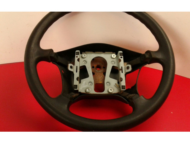 Руль Mitsubishi Carisma 1996 - 1999 года Comdesgaste