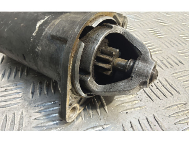 Стартер 0001110115 Opel Astra F