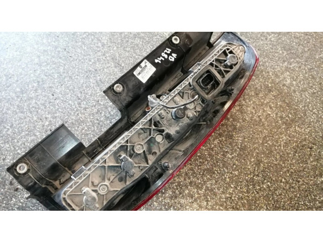 Задний фонарь левый 00518106740 Fiat Doblo 2010-2022 года