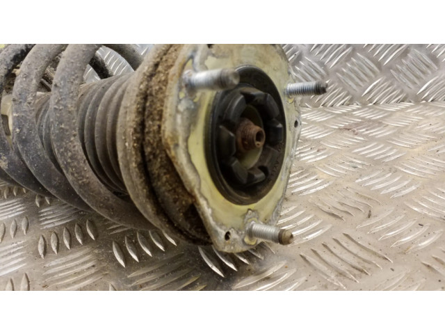 Передний амортизатор