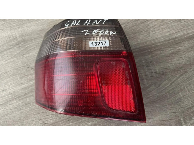 Задний фонарь левый 22087201 Mitsubishi Galant 1997-2003 года