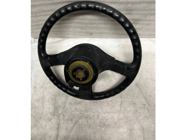 Руль Mitsubishi Colt 1989 - 1992 года MB564540, 1313