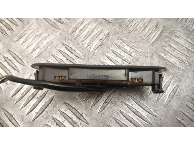 Кнопка крюка в багажнике