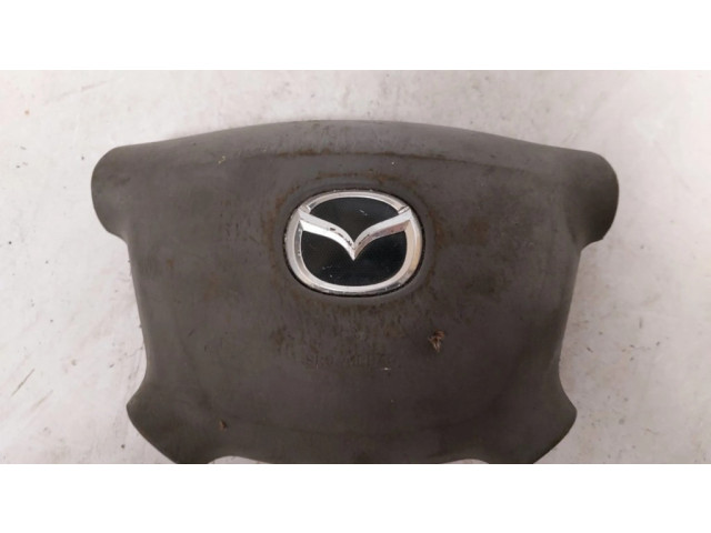 Подушка безопасности водителя G54M57K0004, T93106A Mazda 626