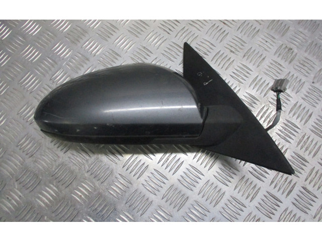 Zpětné zrcátko  Nissan Primera 2004    