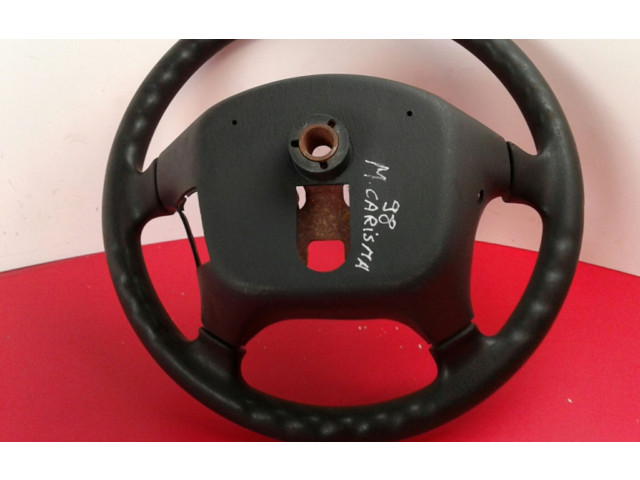 Руль Mitsubishi Carisma 1996 - 1999 года Comdesgaste