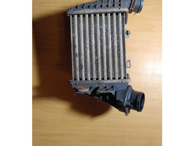 Интеркулер 1231877 Volkswagen Golf III