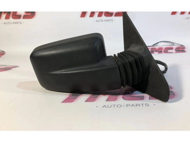 Zpětné zrcátko Peugeot 309 1985 e200707