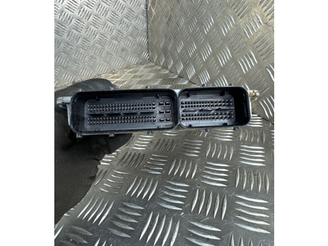 Блок управления двигателя 03L906023MM, 03L907425C Volkswagen Caddy