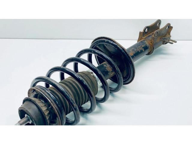 Передний амортизатор с пружиной      