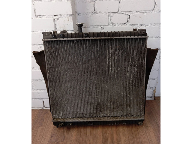 Радиатор охлаждающей жидкости    Infiniti  QX56   -  года