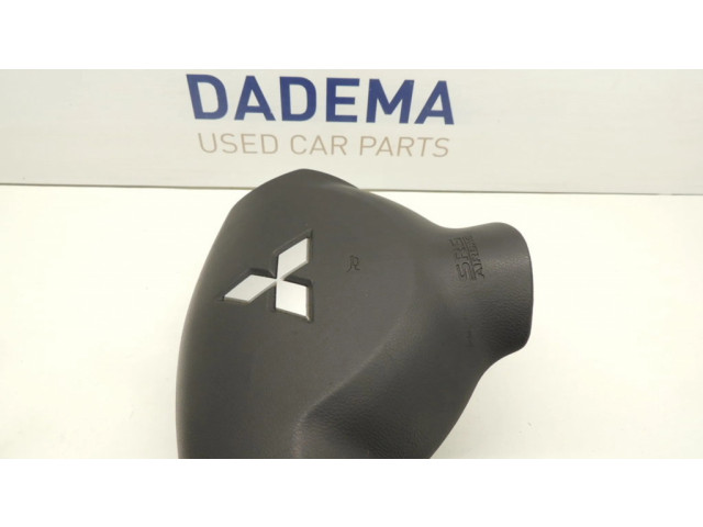 Подушка безопасности водителя 7030A088XA, 607063500A Mitsubishi Outlander