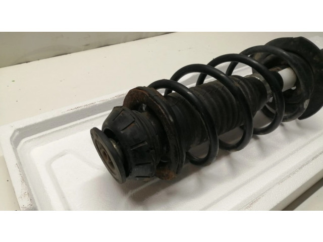 Передний амортизатор