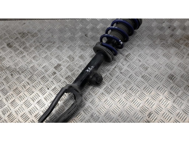 Передний амортизатор