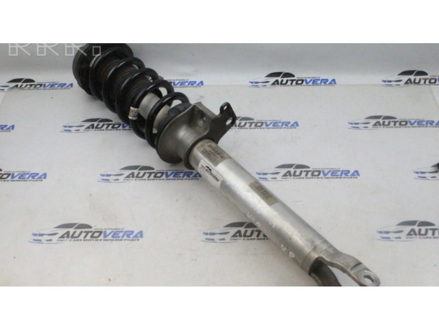 Передний амортизатор с пружиной      