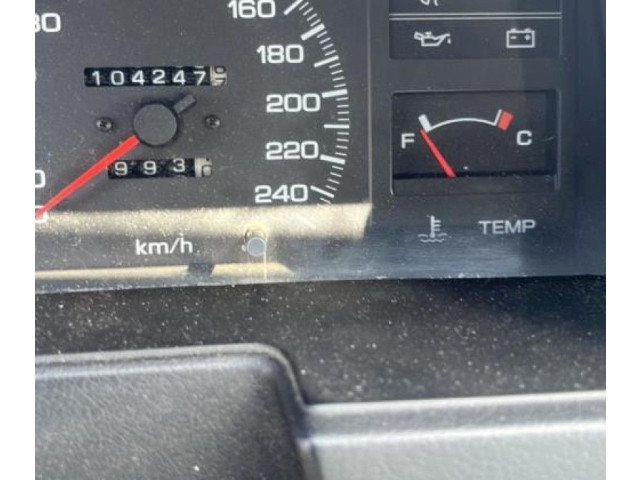 Zpětné zrcátko Nissan Sunny 1990