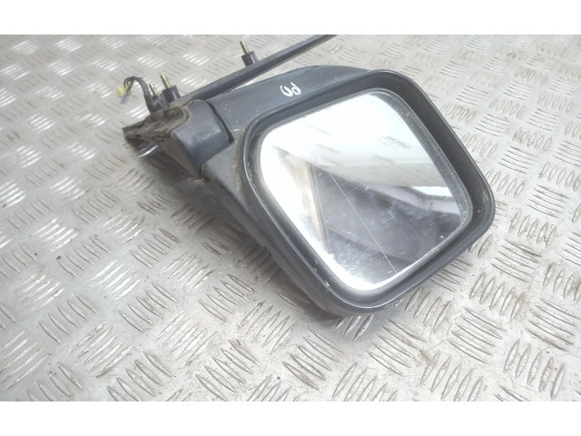 Zpětné zrcátko Mitsubishi Pajero 1997