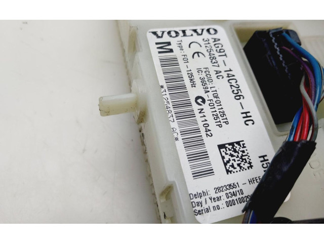 Блок управления надувных подушек AG9T14C256HC   Volvo XC70