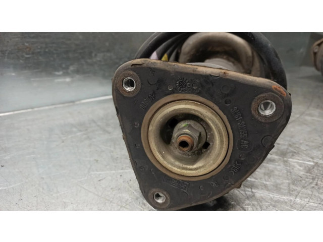 Передний амортизатор