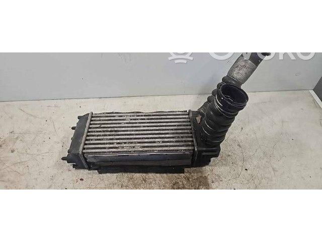 Радиатор интеркулера 8V519L440AD   Ford  Fiesta  2009 - 2012 года