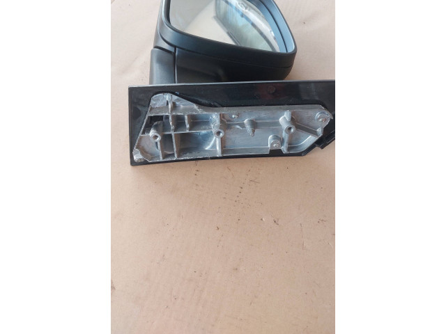 Zpětné zrcátko  Volkswagen Caddy 2006  E9024558  