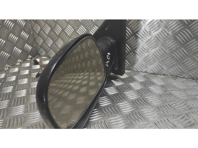 Zpětné zrcátko  levé Dodge Caravan 2003    