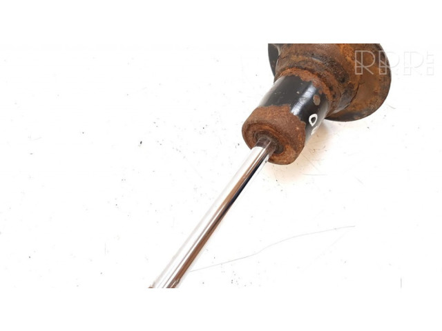 Передний амортизатор