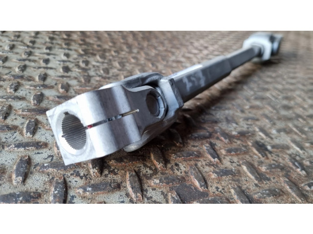 Крестовидная связь оси рулевого колеса