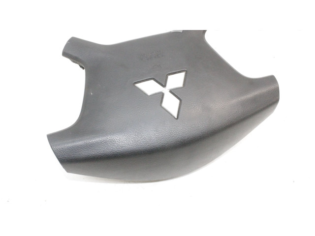 Подушка безопасности водителя 7030A099 Mitsubishi Pajero