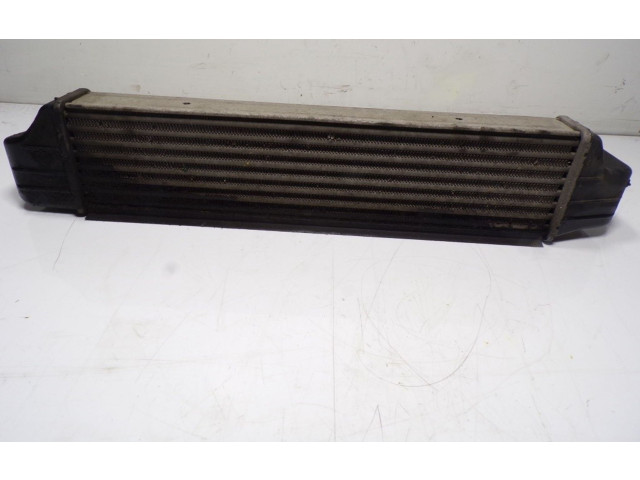 Интеркулер  17517793370, 77897930   BMW X3 E83 