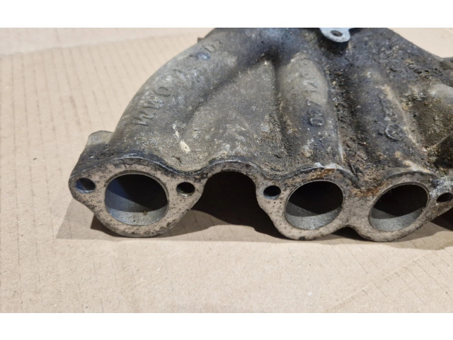 Всасывающий коллектор 027129713    Volkswagen Golf II