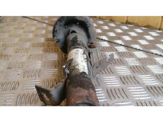 Передний амортизатор