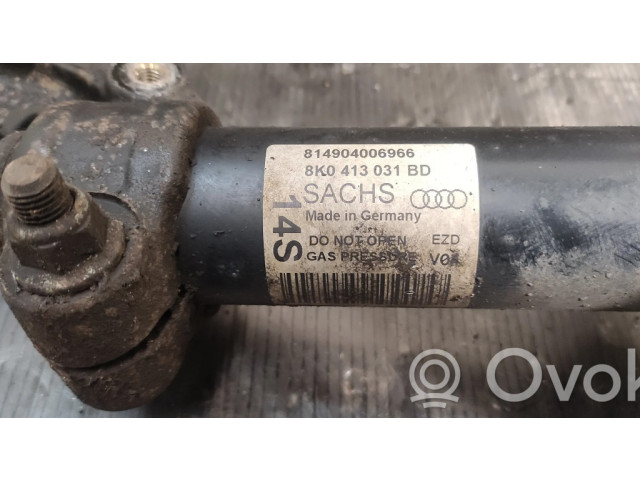 Передний амортизатор