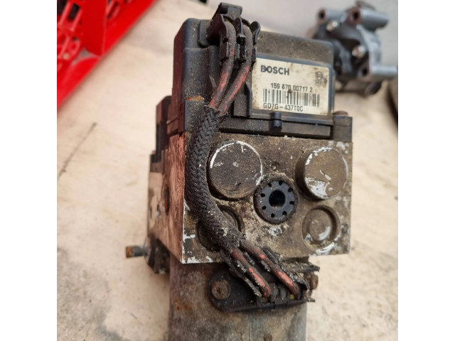 Блок АБС GD7G437T0C, 159870007172 Mazda 626 1998-2002 года