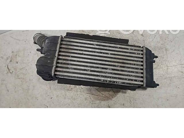 Радиатор интеркулера 8V519L440AD   Ford  Fiesta  2009 - 2012 года