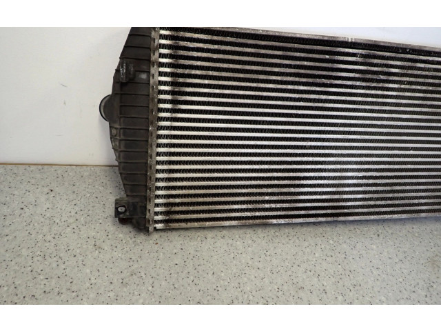 Радиатор интеркулера    KIA Carens II