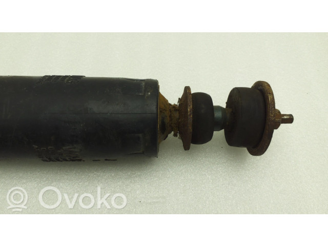 Передний амортизатор