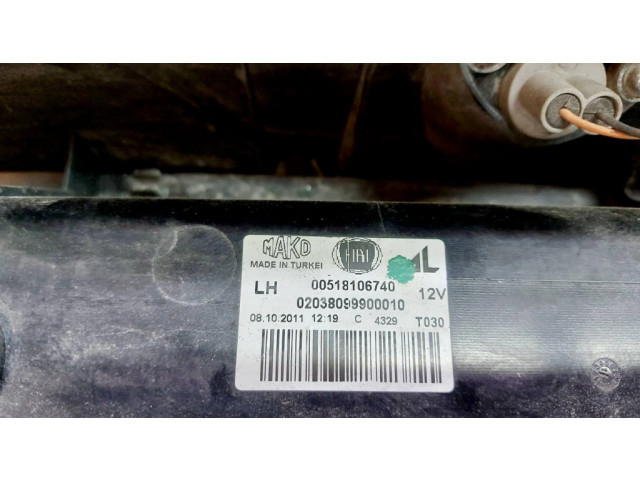 Задний фонарь левый сзади 00518106740 Fiat Doblo 2010-2022 года