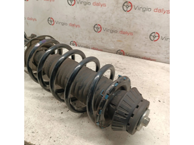 Передний амортизатор