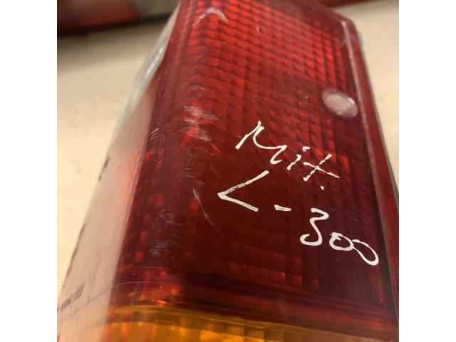 Задний фонарь левый сзади 22037445 Mitsubishi L300, Cosmos