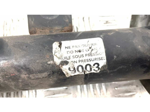 Передний амортизатор