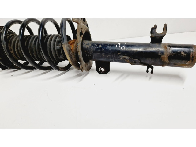 Передний амортизатор с пружиной      