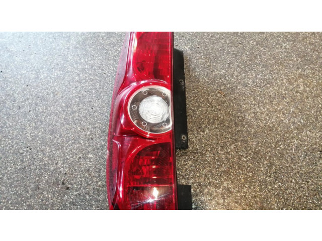 Задний фонарь левый 00518106740 Fiat Doblo 2010-2022 года